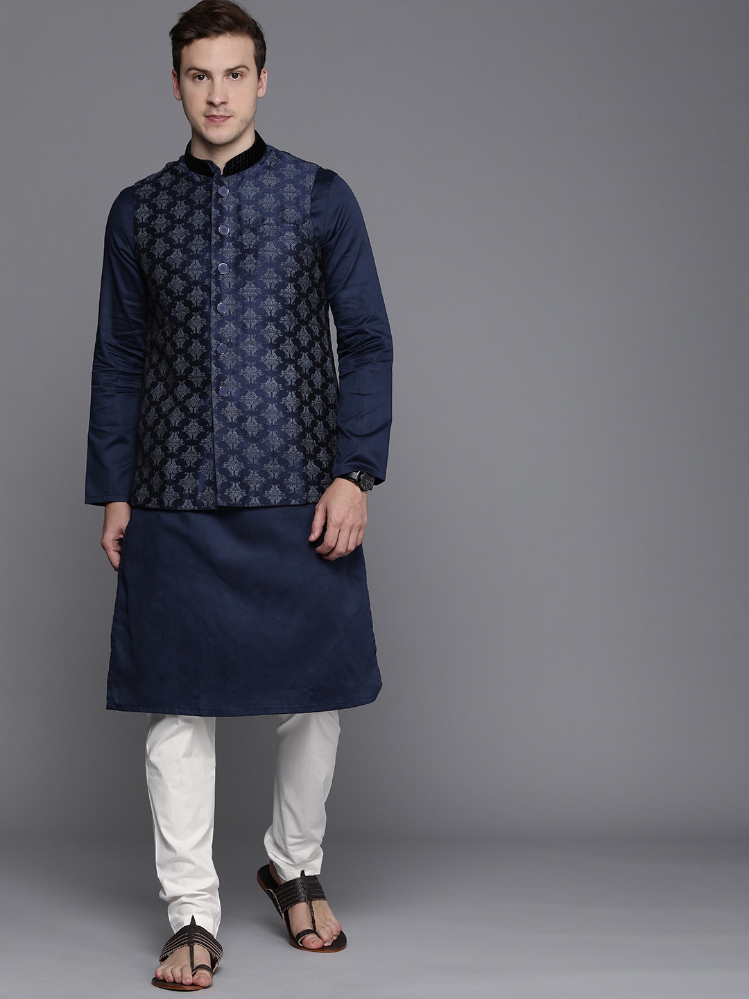 Manyavar Men Navy Blue Self Design Thread Work Art Silk Kurta with Churidar & Nehru Jacket
Manyavar Men Navy Blue Self Design Thread Work Art Silk Kurta with Churidar & Nehru Jacket