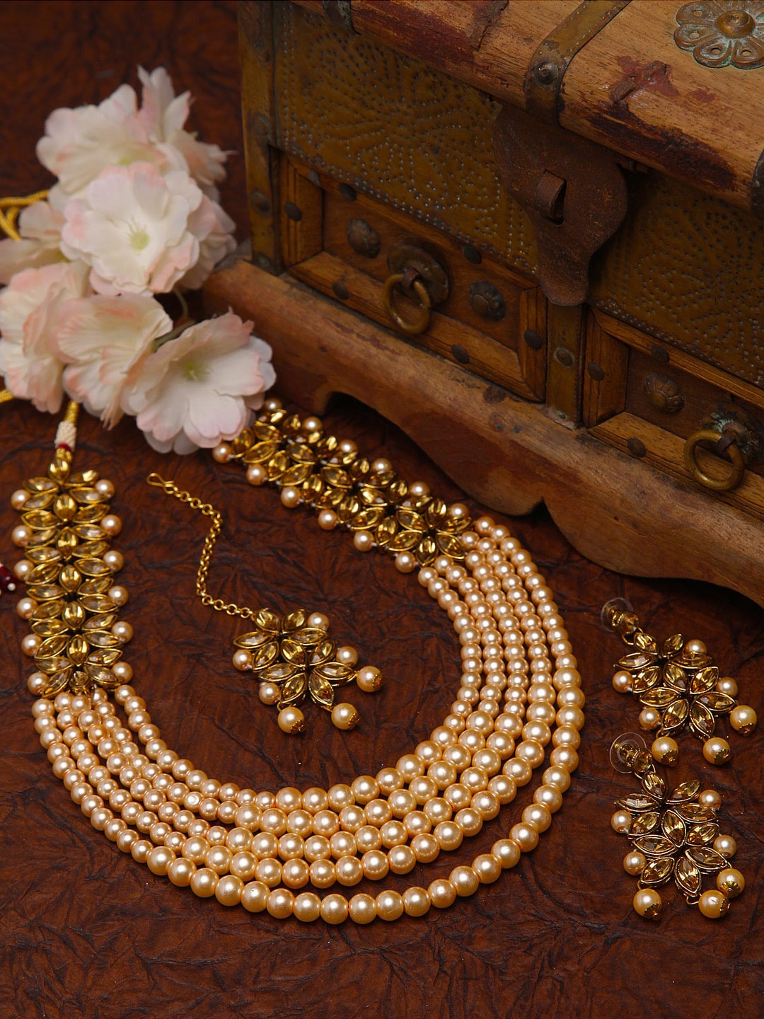 Shining Diva Gold Plated White Kundan Studded & Pearl Beaded Multi-Stranded Jewellery Set
Shining Diva Gold Plated White Kundan Studded & Pearl Beaded Multi-Stranded Jewellery Set