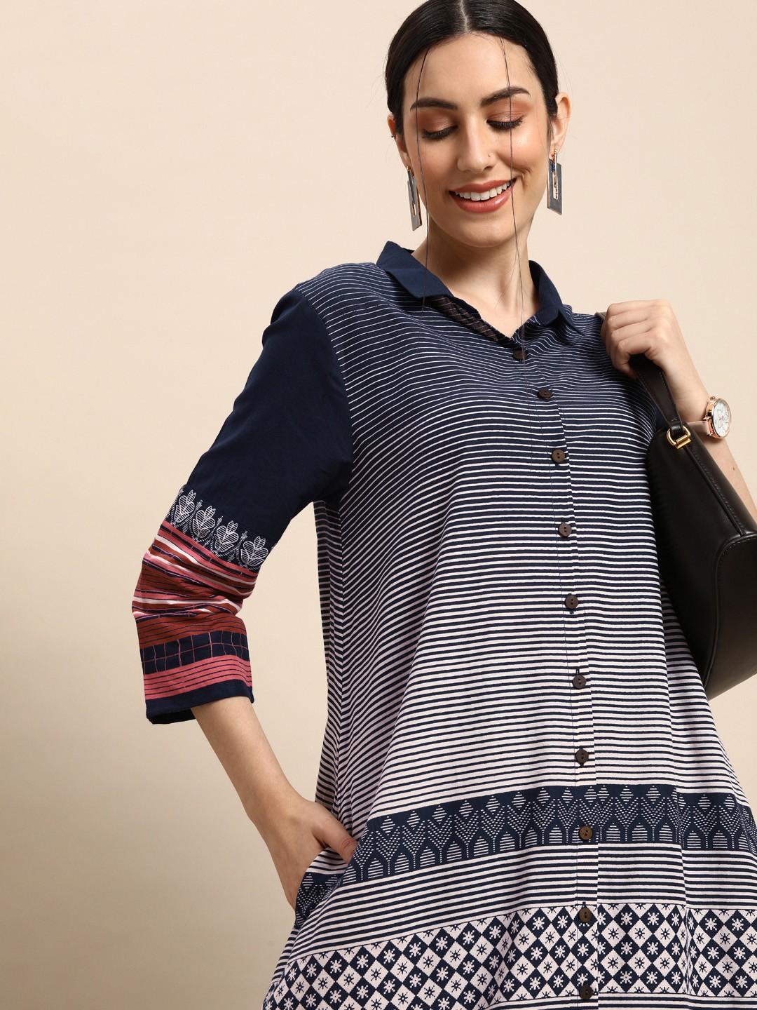 Anouk Women Navy Blue & White Striped And Printed Shirt-Collar Pure Cotton A-Line Kurta
Anouk Women Navy Blue & White Striped And Printed Shirt-Collar Pure Cotton A-Line Kurta