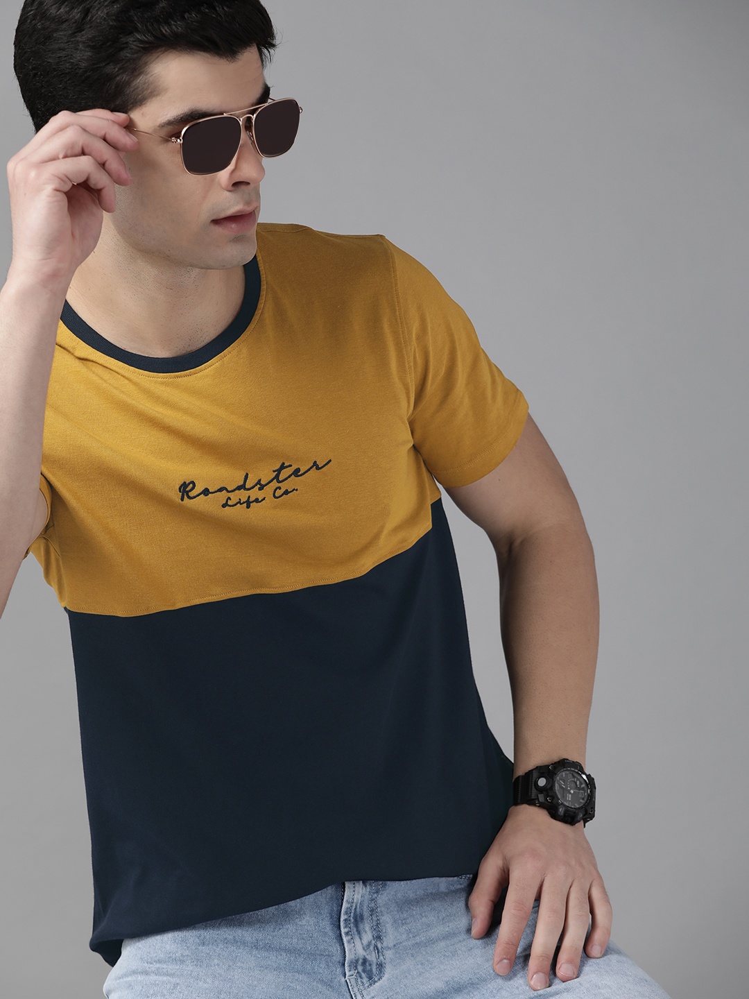 The Roadster Lifestyle Co Men Mustard Yellow & Navy Blue pure Cotton Brand Logo Colourblocked T-shirt
The Roadster Lifestyle Co Men Mustard Yellow & Navy Blue pure Cotton Brand Logo Colourblocked T-shirt