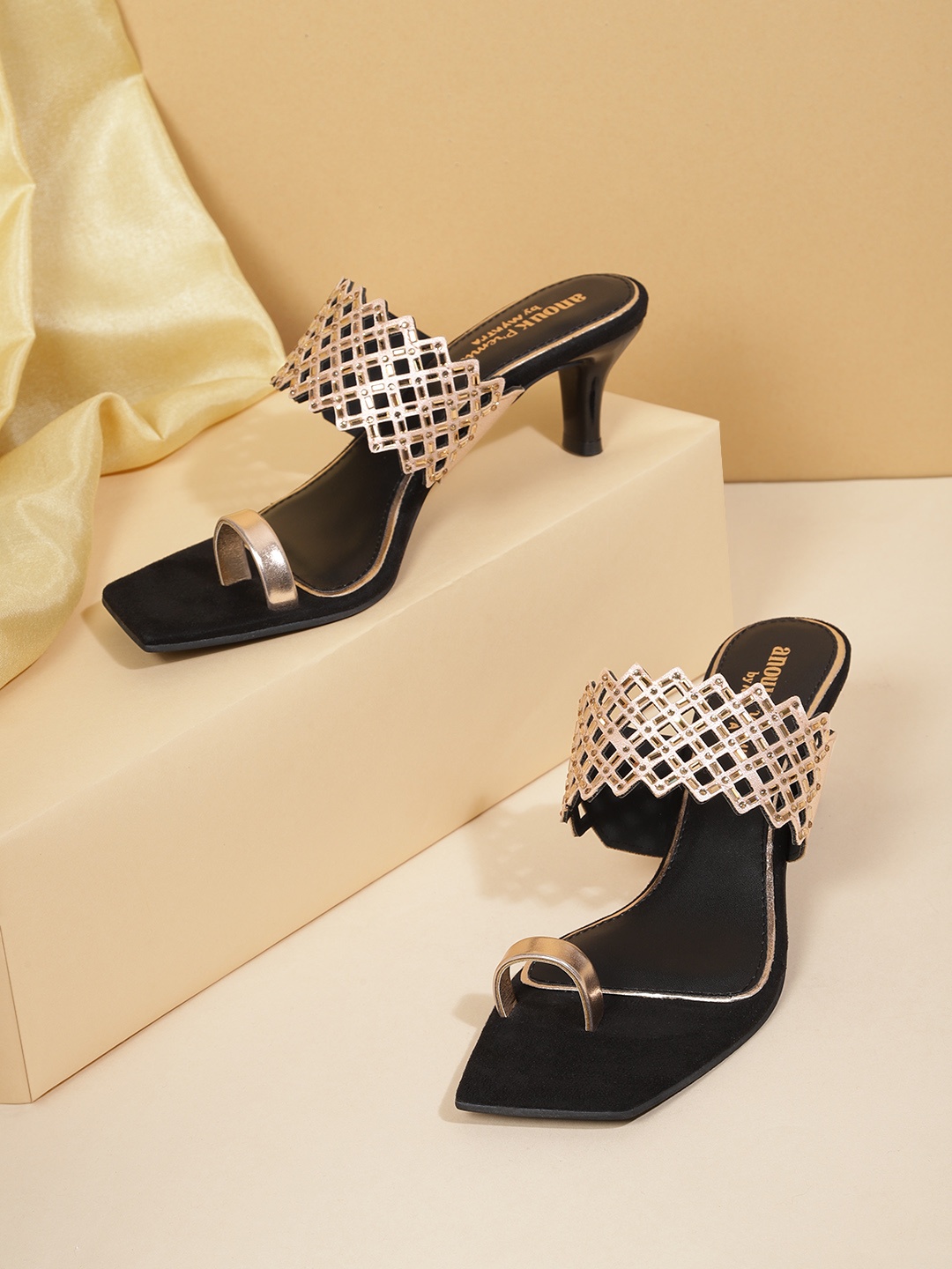 Anouk Women Rose Gold-Toned Ethnic Embellished One-Toe Block Heels with Checked Cut-outs
Anouk Women Rose Gold-Toned Ethnic Embellished One-Toe Block Heels with Checked Cut-outs
