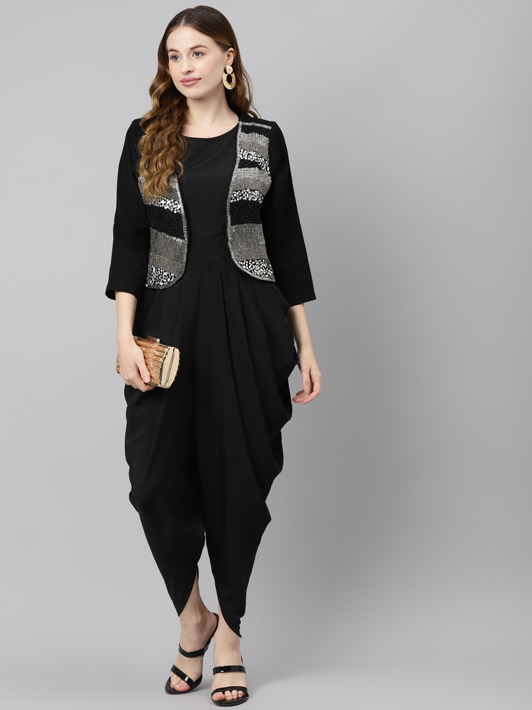 Purple State Black & Silver Solid Dhoti Jumpsuit with Sequinned Ethnic Crop Jacket
Purple State Black & Silver Solid Dhoti Jumpsuit with Sequinned Ethnic Crop Jacket