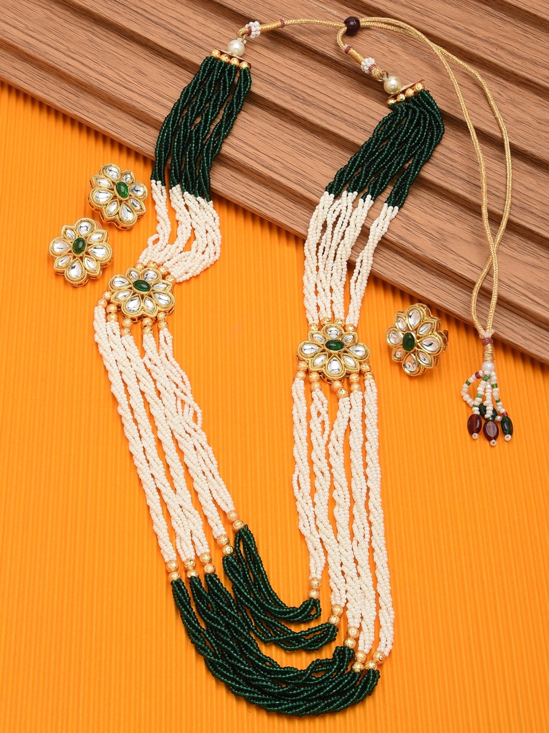 Zaveri Pearls Gold-Plated White & Green Kundan-Studded & Beaded Layered Jewellery Set
Zaveri Pearls Gold-Plated White & Green Kundan-Studded & Beaded Layered Jewellery Set