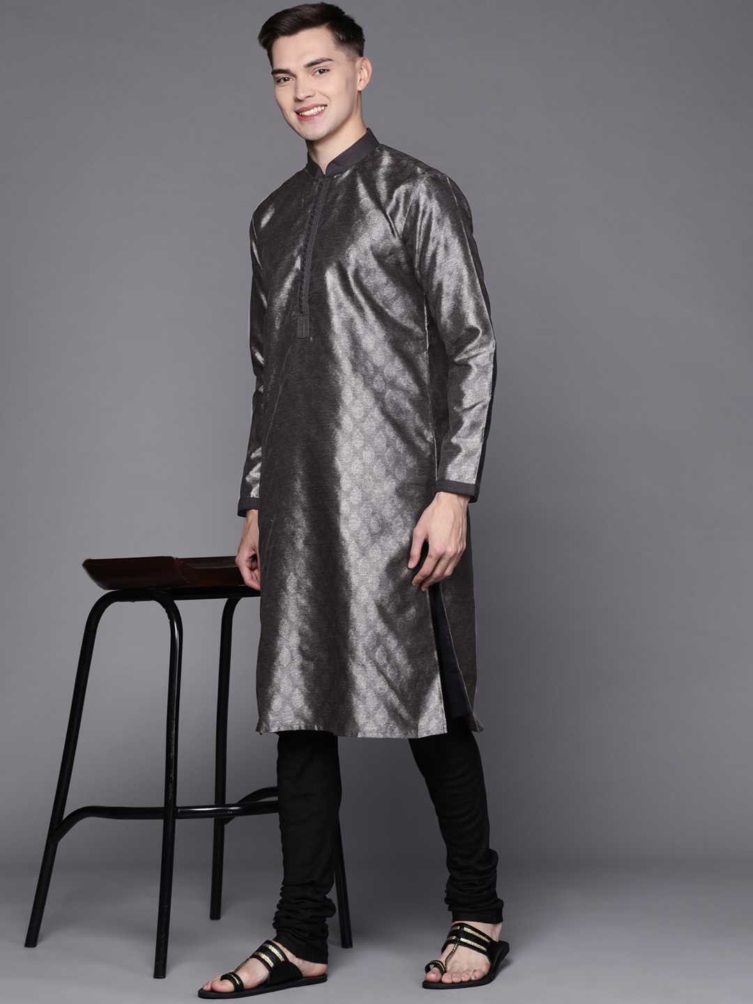 Manu Men Charcoal Grey & Black Ethnic Motifs Jacquard Self-Design Kurta with Churidar
Manu Men Charcoal Grey & Black Ethnic Motifs Jacquard Self-Design Kurta with Churidar