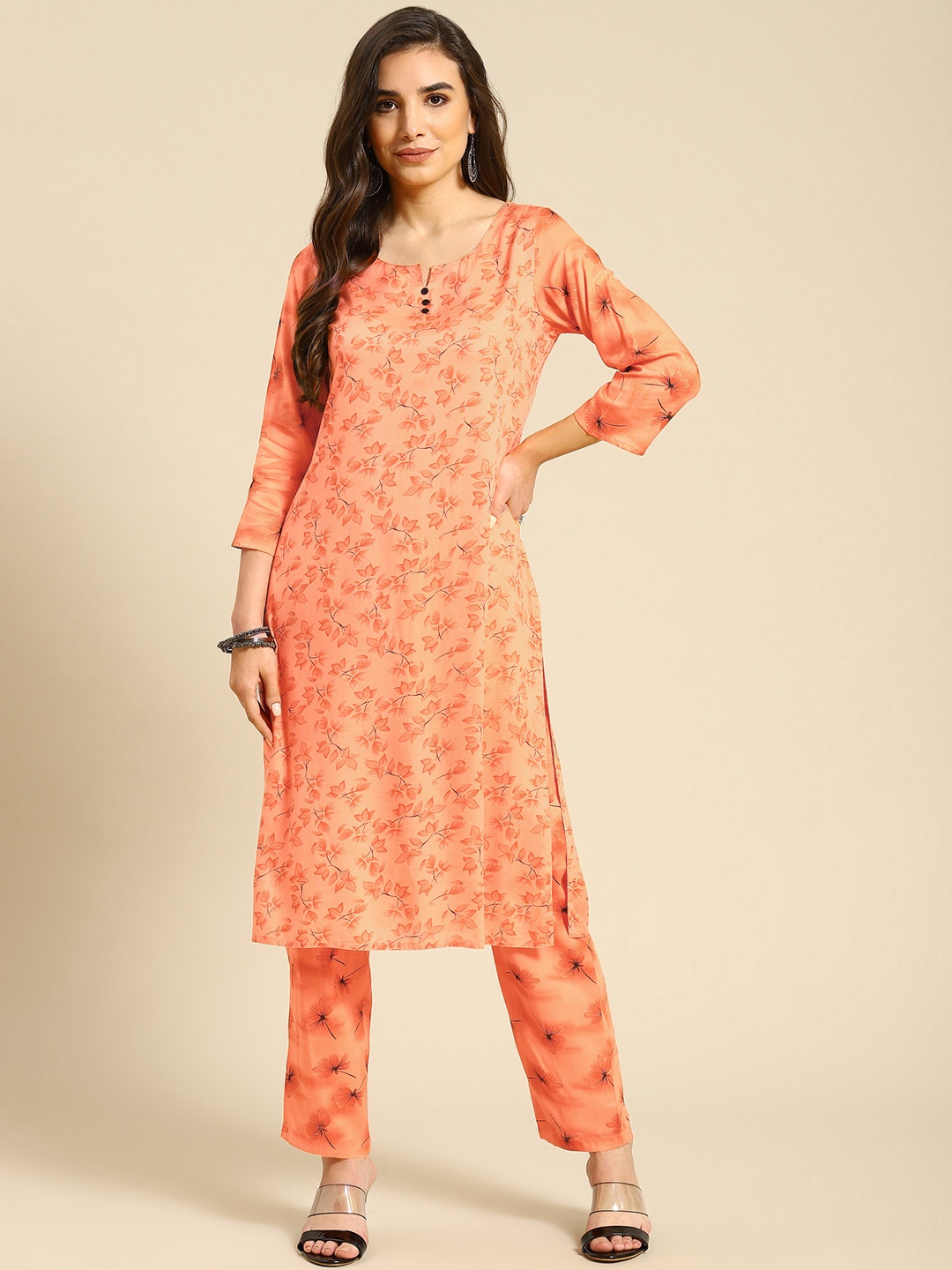 Prakrti Women Peach-Coloured & Black Ethnic Motifs Print Straight Kurta with Trousers
Prakrti Women Peach-Coloured & Black Ethnic Motifs Print Straight Kurta with Trousers
