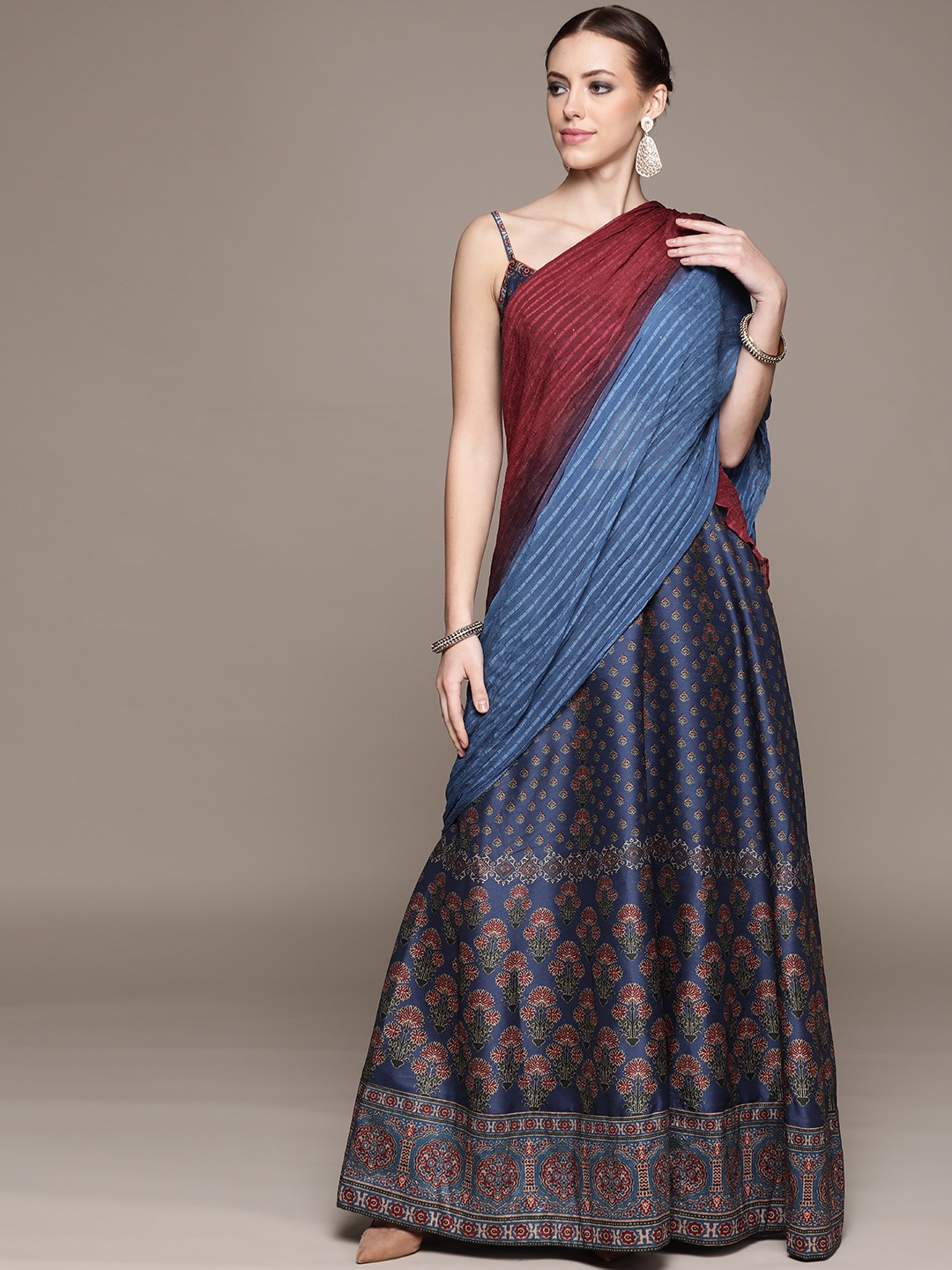aarke Ritu Kumar Teal Blue & Maroon Ethnic Printed Ready to Wear Lehenga & Blouse Dupatta
aarke Ritu Kumar Teal Blue & Maroon Ethnic Printed Ready to Wear Lehenga & Blouse Dupatta