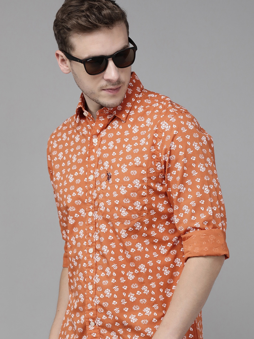 U S Polo Assn Men Rust Orange & White Tailored Fit Ditsy Floral Print Cotton Casual Shirt
U S Polo Assn Men Rust Orange & White Tailored Fit Ditsy Floral Print Cotton Casual Shirt