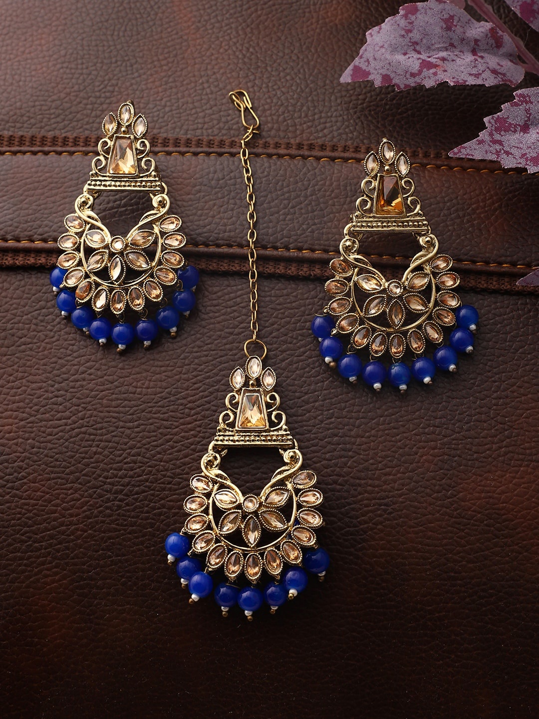 ANIKAS CREATION Blue & Beige Gold-Plated Kundan Stone Studded & Beaded Jewellery Set
ANIKAS CREATION Blue & Beige Gold-Plated Kundan Stone Studded & Beaded Jewellery Set