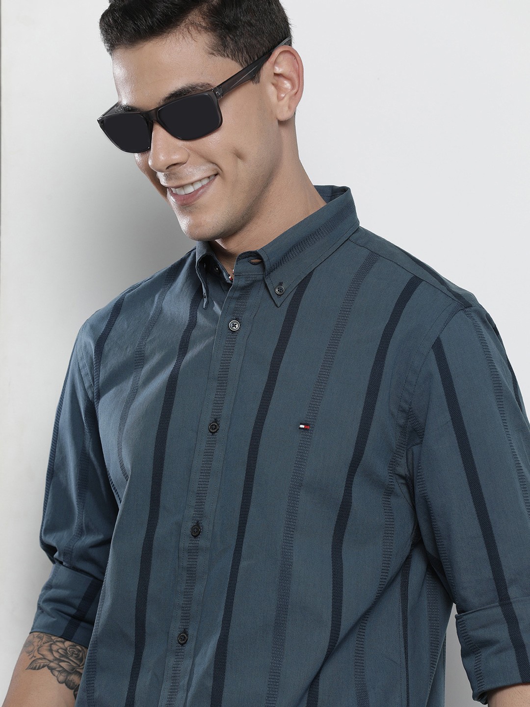 Tommy Hilfiger Men Carbon Navy & Black Vertical Striped Regular Fit Casual Shirt, Blue
Tommy Hilfiger Men Carbon Navy & Black Vertical Striped Regular Fit Casual Shirt, Blue