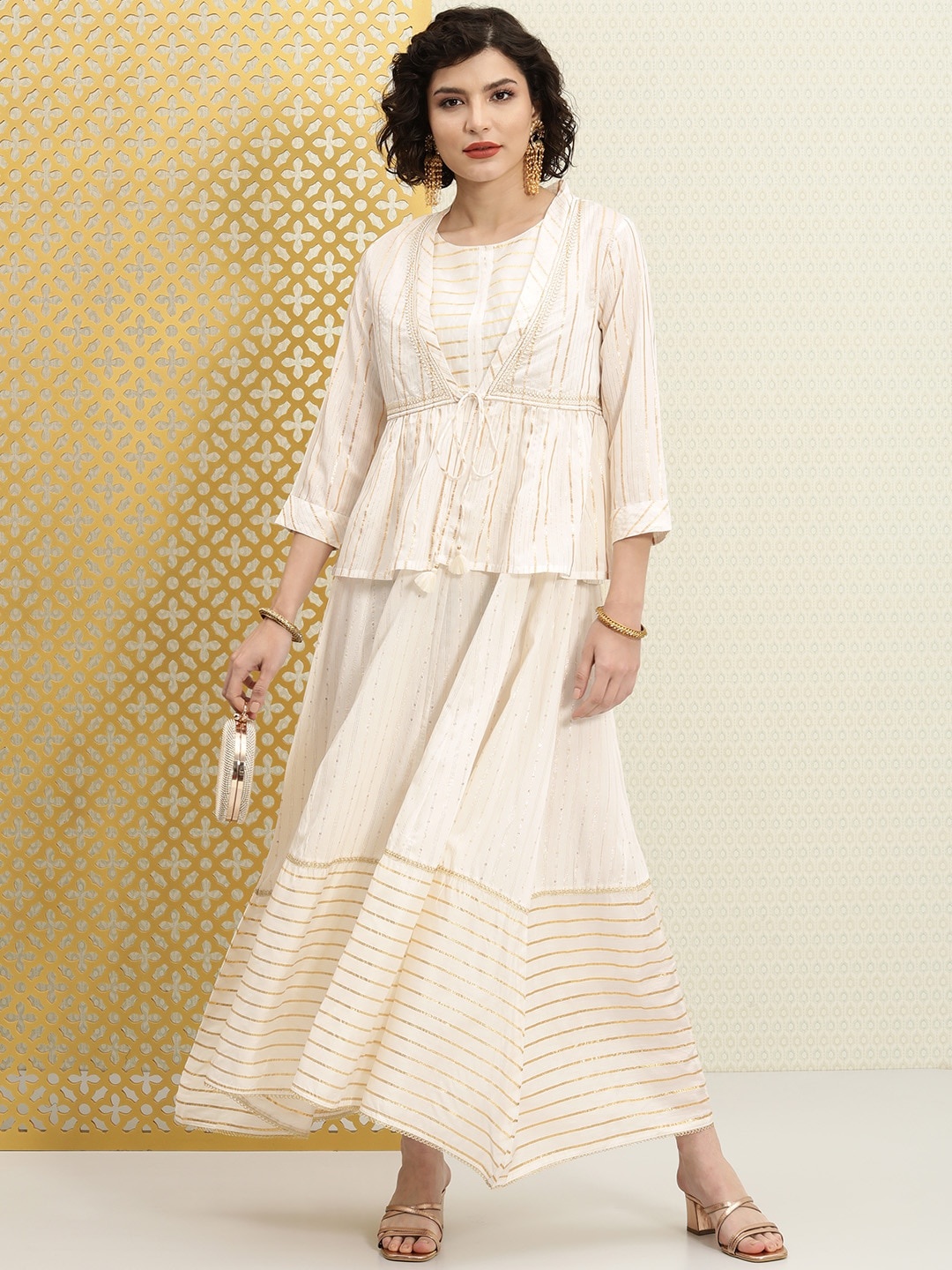 House of Pataudi White & Golden Sequined Striped Jashn Ethnic Maxi Dress & Ethnic Jacket
House of Pataudi White & Golden Sequined Striped Jashn Ethnic Maxi Dress & Ethnic Jacket