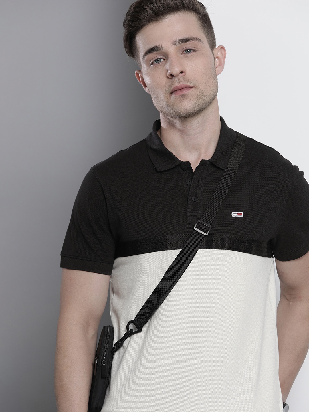 Tommy Hilfiger Men Black & Off White Colourblocked Polo Collar Organic Cotton T-shirt
Tommy Hilfiger Men Black & Off White Colourblocked Polo Collar Organic Cotton T-shirt