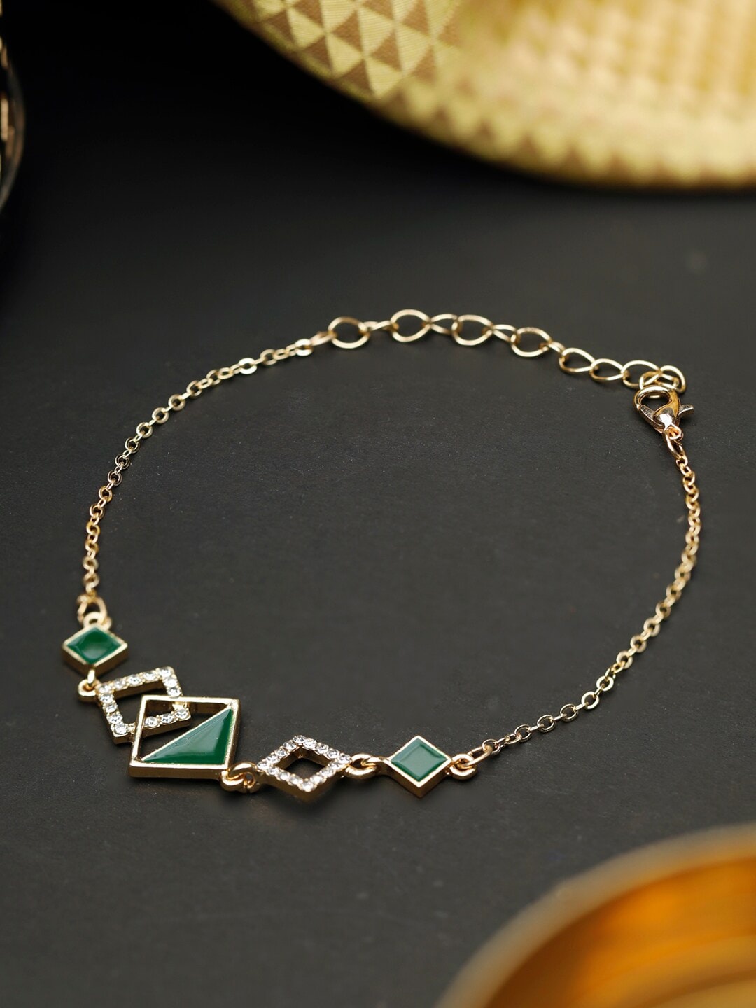 PRITA BY PRIYAASI Women Gold-Toned & Green American Diamond Gold-Plated Link Bracelet
PRITA BY PRIYAASI Women Gold-Toned & Green American Diamond Gold-Plated Link Bracelet