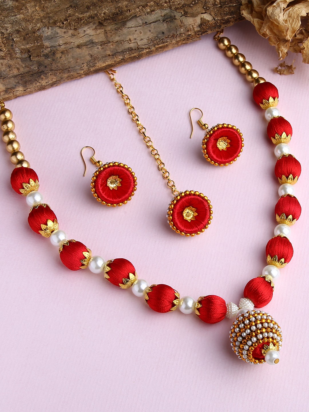 AKSHARA Gold-Plated White & Red Stone-Studded & Beaded Wooden Balls Silk Thread Jewellery Set
AKSHARA Gold-Plated White & Red Stone-Studded & Beaded Wooden Balls Silk Thread Jewellery Set