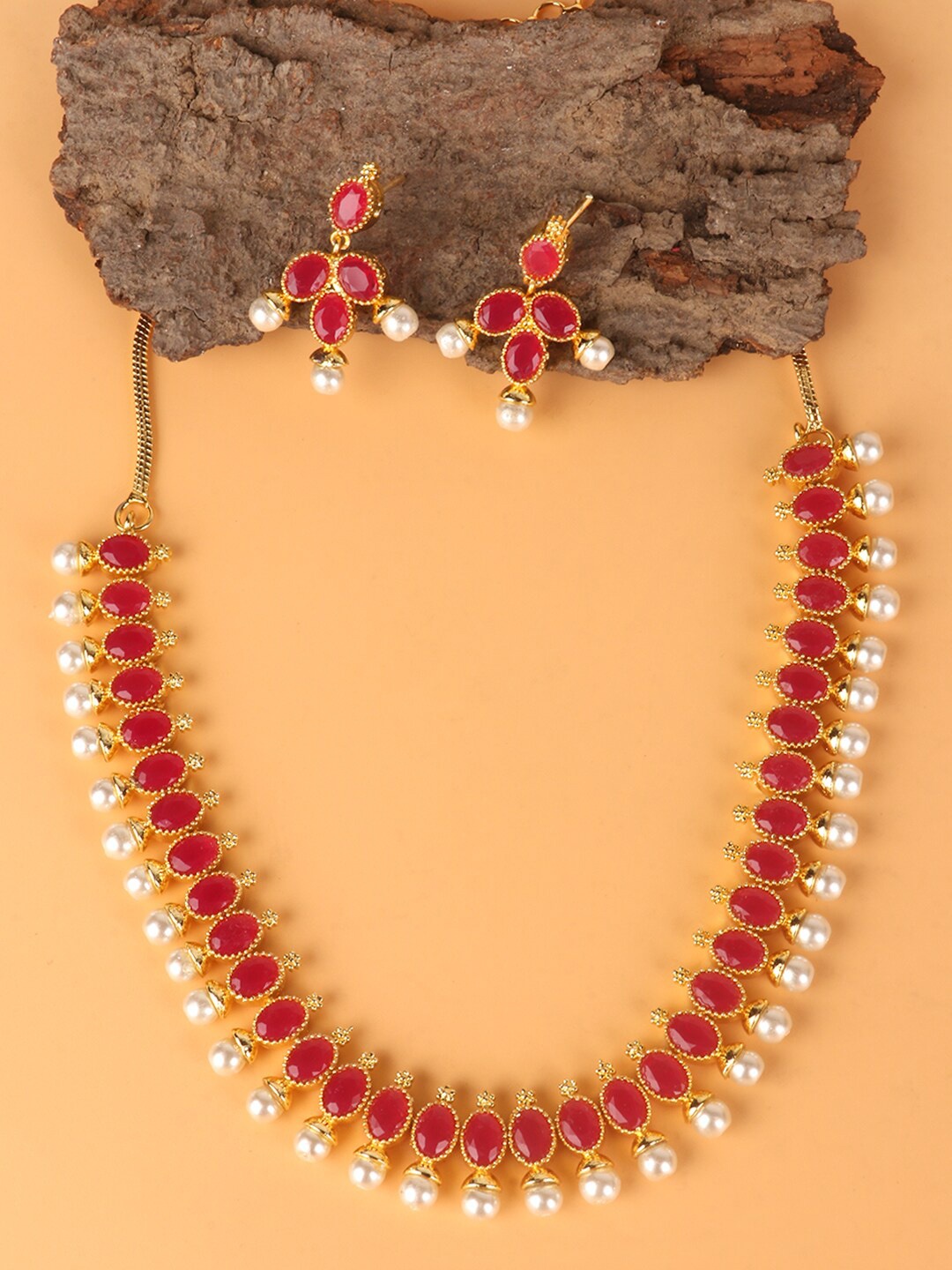 PENNY JEWELS Gold-Plated Red & White Stone-Studded & Beaded Traditional Jewellery Set
PENNY JEWELS Gold-Plated Red & White Stone-Studded & Beaded Traditional Jewellery Set