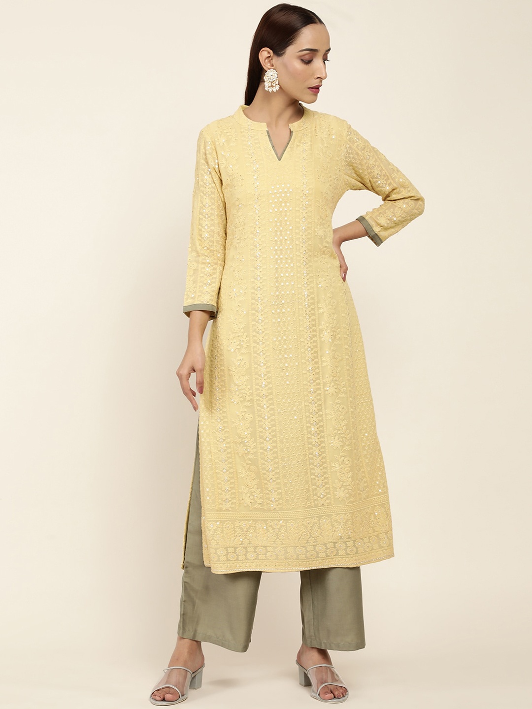 Soch Women Yellow Ethnic Motifs Embroidered Panelled Chikankari Kurti with Trousers
Soch Women Yellow Ethnic Motifs Embroidered Panelled Chikankari Kurti with Trousers