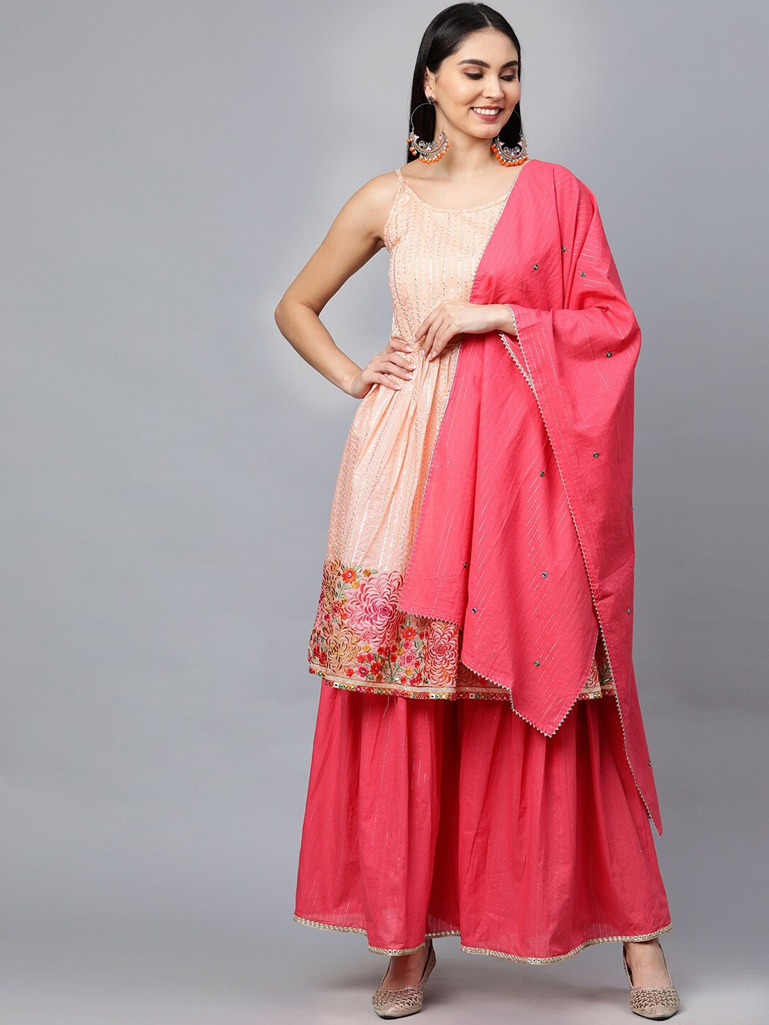 FASHOR Women Peach-Coloured Floral Embroidered Sequinned Chanderi Silk Kurti with Sharara & With Dupatta
FASHOR Women Peach-Coloured Floral Embroidered Sequinned Chanderi Silk Kurti with Sharara & With Dupatta