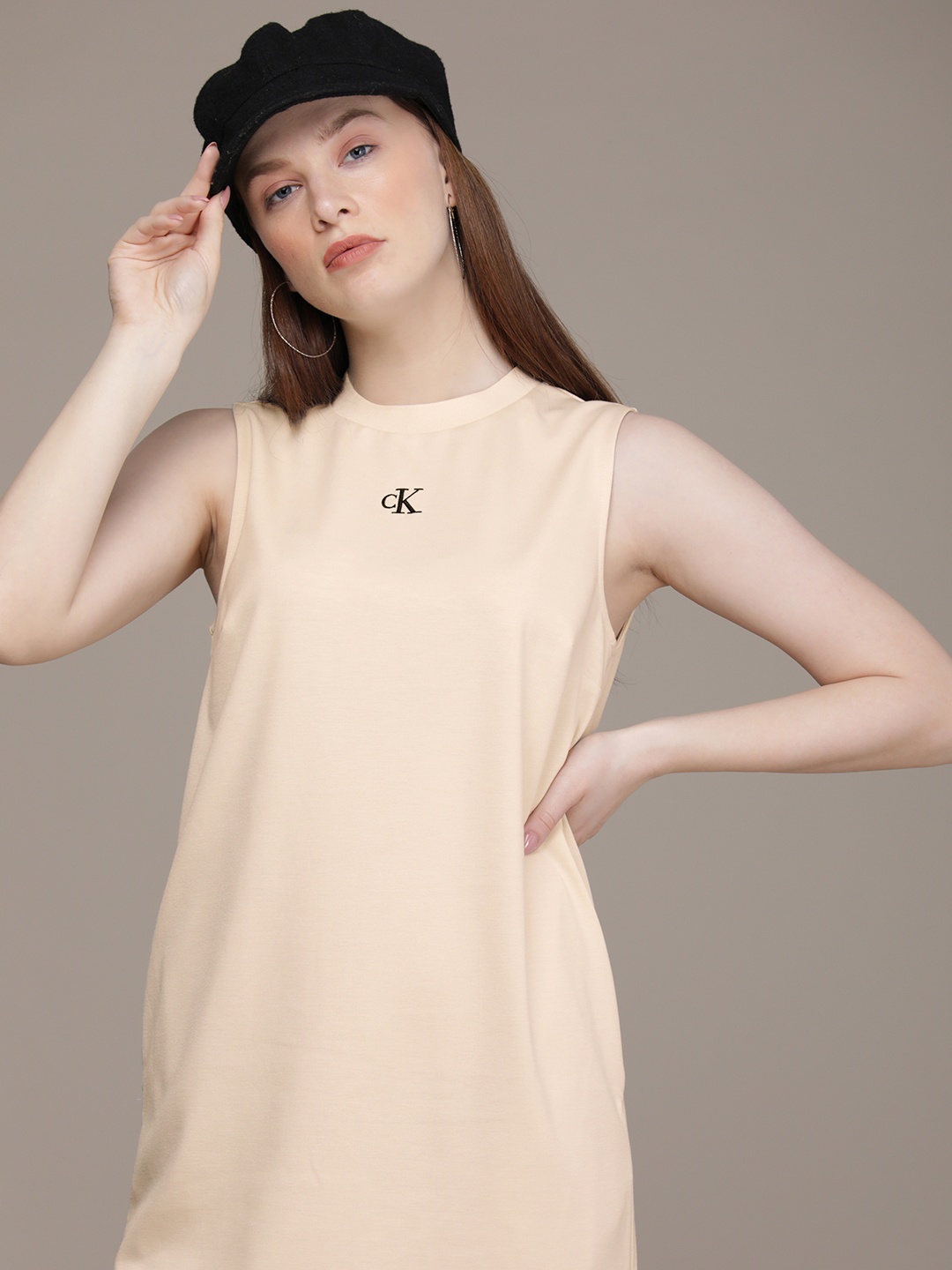 Calvin Klein Jeans Beige Solid Round Neck Brand Logo Embroidered Knitted Slip A-Line Dress
Calvin Klein Jeans Beige Solid Round Neck Brand Logo Embroidered Knitted Slip A-Line Dress