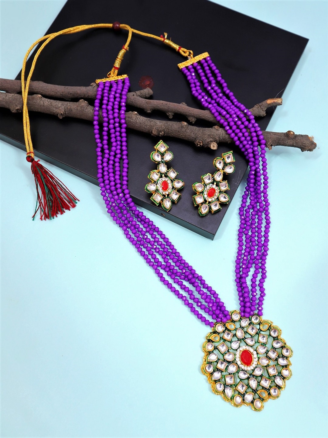 Crunchy Fashion Gold-Plated White & Purple Kundan Studded & Beaded Antique Jewellery Set
Crunchy Fashion Gold-Plated White & Purple Kundan Studded & Beaded Antique Jewellery Set