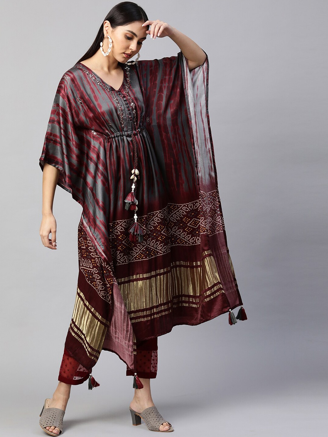 FASHOR Women Grey & Maroon Ethnic Motifs Printed Flared Sleeves Mirror Work Kaftan Kurta
FASHOR Women Grey & Maroon Ethnic Motifs Printed Flared Sleeves Mirror Work Kaftan Kurta