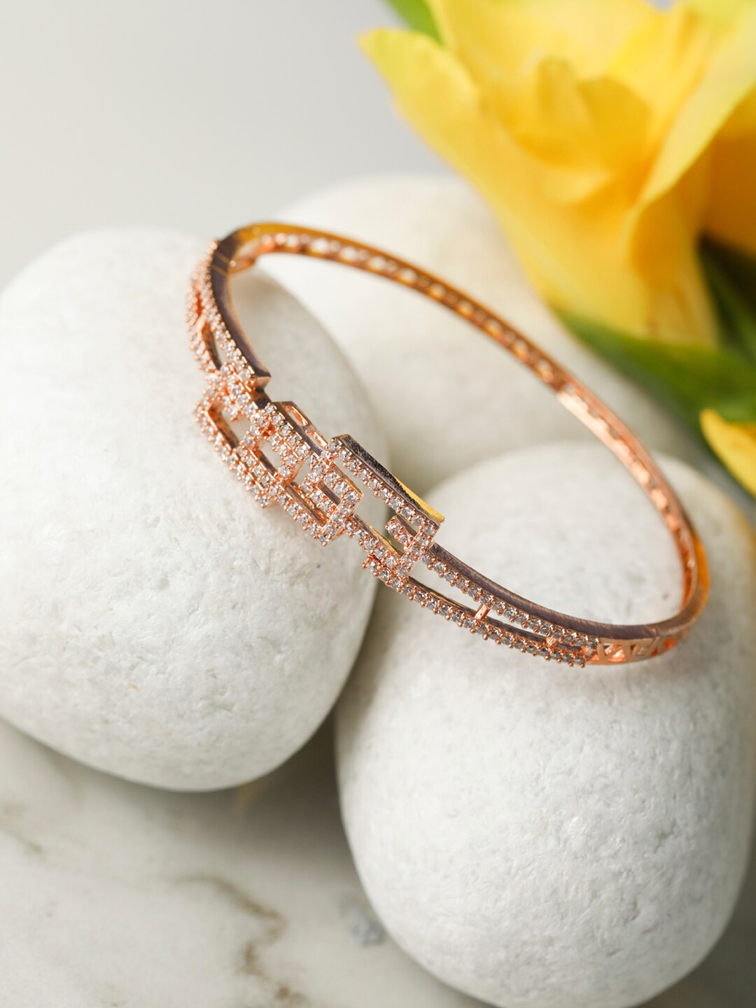 Priyaasi Women Rose Gold & White Brass American Diamond Rose Gold-Plated Bangle-Style Bracelet
Priyaasi Women Rose Gold & White Brass American Diamond Rose Gold-Plated Bangle-Style Bracelet