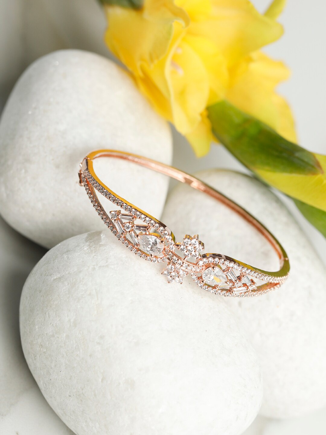 Priyaasi Women Rose Gold & White Brass American Diamond Rose Gold-Plated Bangle-Style Bracelet
Priyaasi Women Rose Gold & White Brass American Diamond Rose Gold-Plated Bangle-Style Bracelet