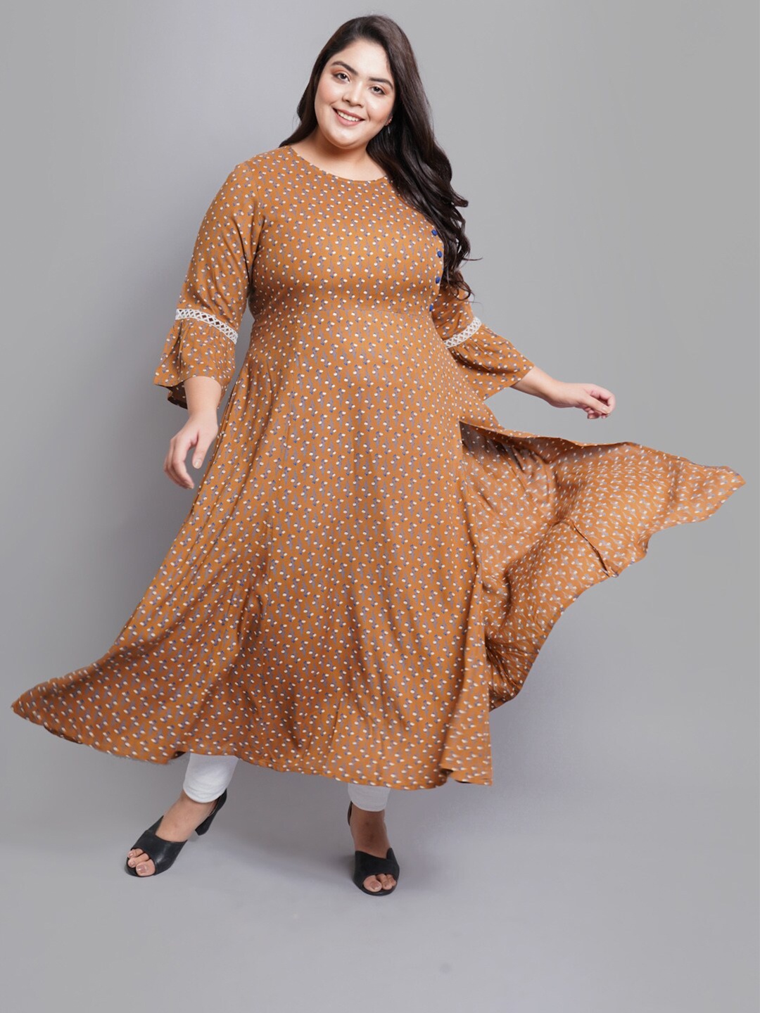 YASH GALLERY Women Brown & Blue Ethnic Motifs Printed Bell Sleeves A-line Kurta
YASH GALLERY Women Brown & Blue Ethnic Motifs Printed Bell Sleeves A-line Kurta