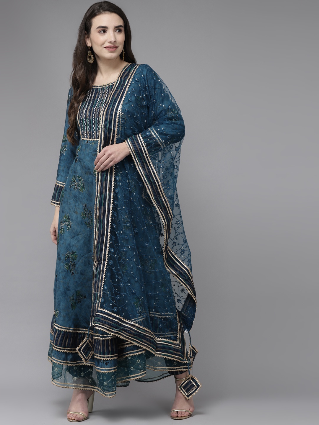 Ishin Women Teal Floral Embroidered Empire Beads and Stones Kurta with Trousers & With Dupatta
Ishin Women Teal Floral Embroidered Empire Beads and Stones Kurta with Trousers & With Dupatta