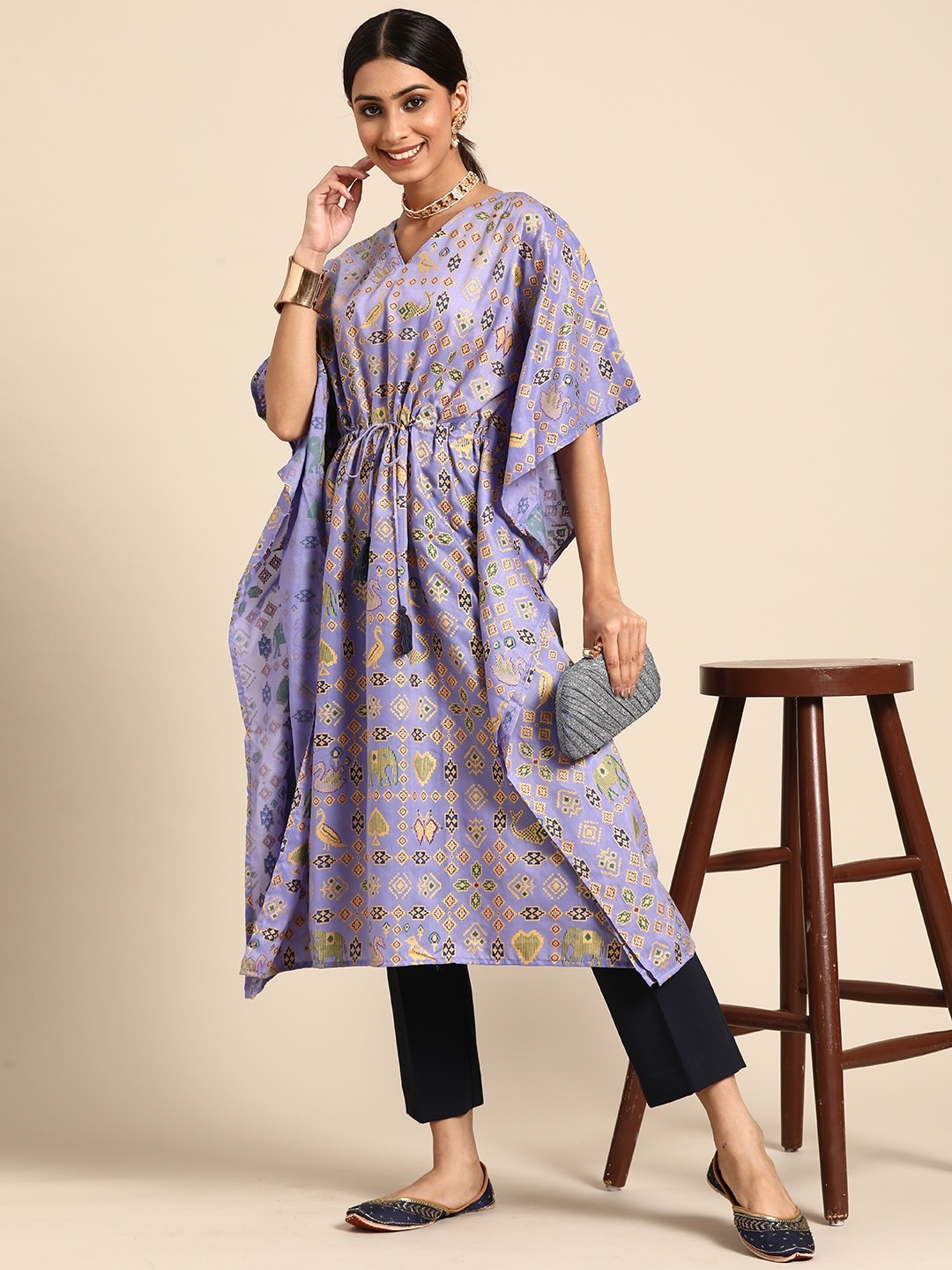 Sangria Women Lavender & Golden Ethnic Motifs Printed Flared Sleeves Cotton Kaftan Kurta
Sangria Women Lavender & Golden Ethnic Motifs Printed Flared Sleeves Cotton Kaftan Kurta