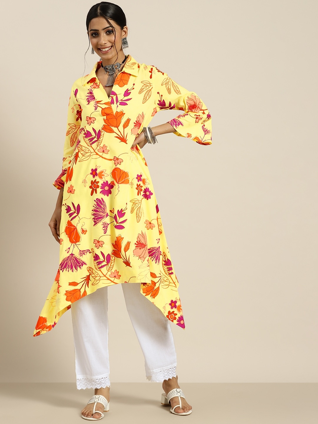 Sangria Women Yellow & Orange Ethnic Motifs Printed Bell Sleeves Asymmetric Jacquard Kurta
Sangria Women Yellow & Orange Ethnic Motifs Printed Bell Sleeves Asymmetric Jacquard Kurta