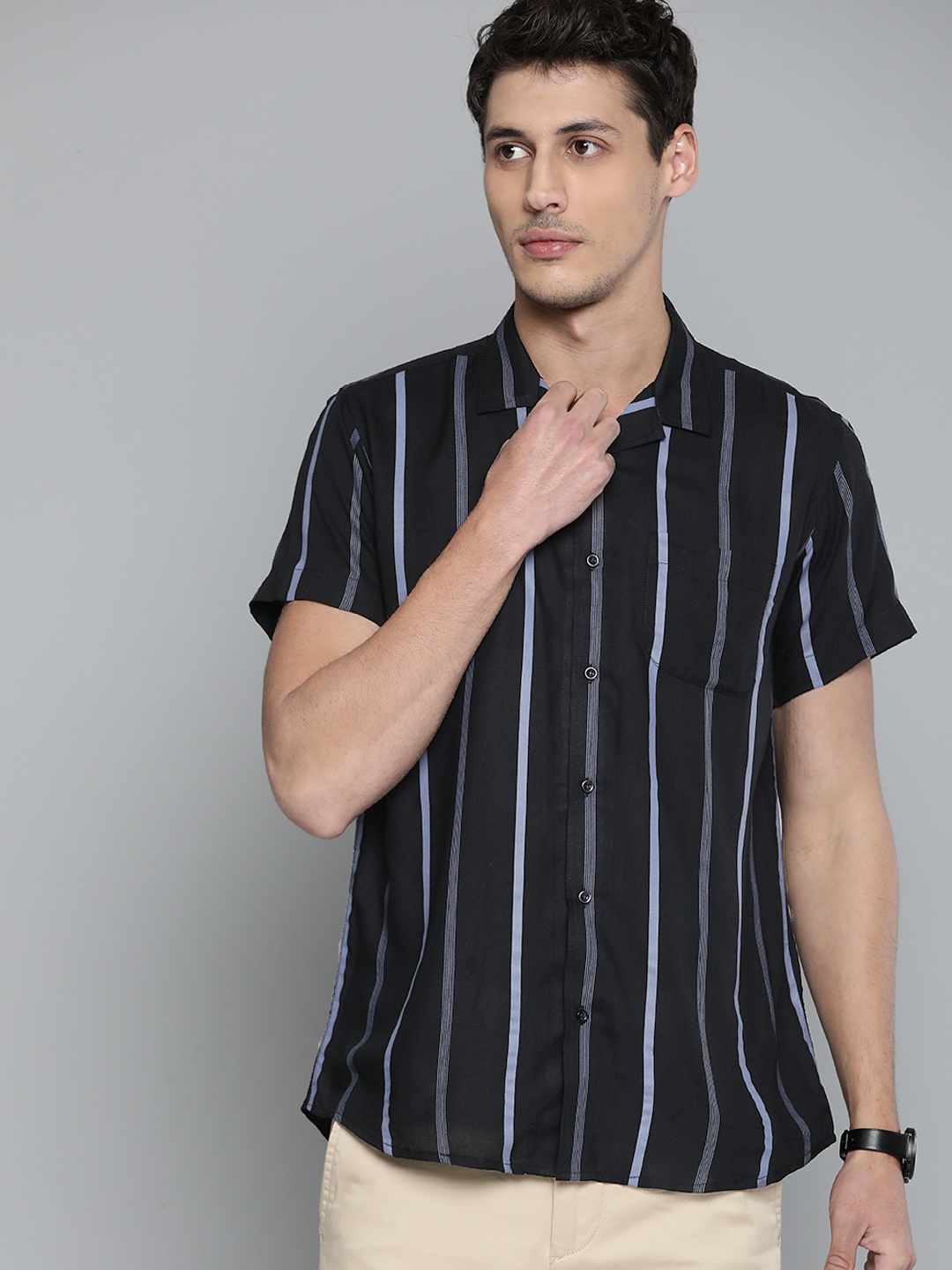 DENNISON Men Black Smart Slim Fit Vertical Stripes Opaque Casual Shirt with Chest Pocket
DENNISON Men Black Smart Slim Fit Vertical Stripes Opaque Casual Shirt with Chest Pocket