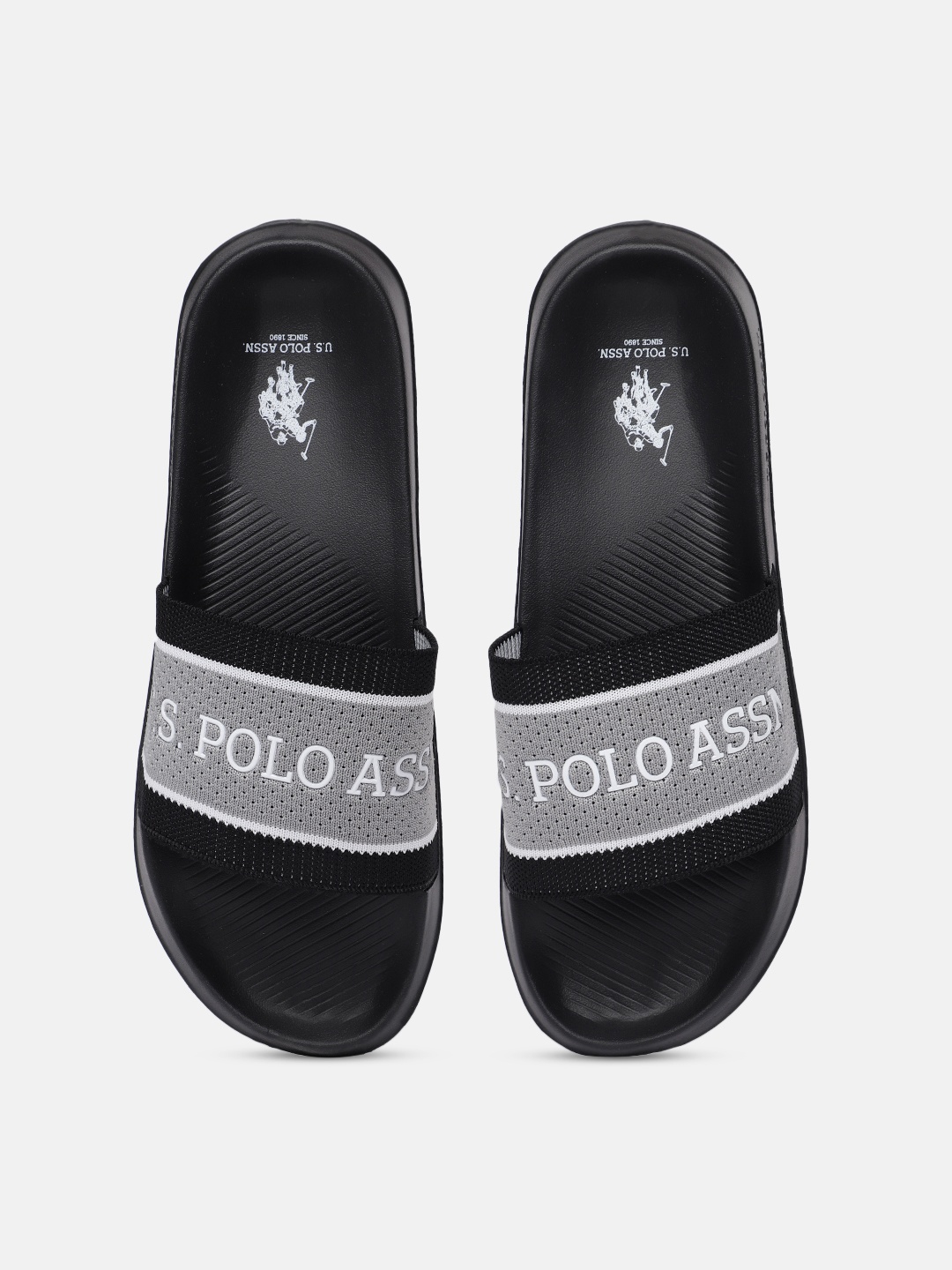 U.S. Polo Assn. Men Black & Grey Nicholson 2.0 Self Design Applique Synthetic Sliders
U.S. Polo Assn. Men Black & Grey Nicholson 2.0 Self Design Applique Synthetic Sliders