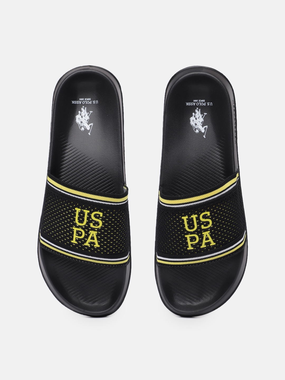 U.S. Polo Assn. Men Black & Yellow Breyton 2.0 Self Design Applique Synthetic Sliders
U.S. Polo Assn. Men Black & Yellow Breyton 2.0 Self Design Applique Synthetic Sliders