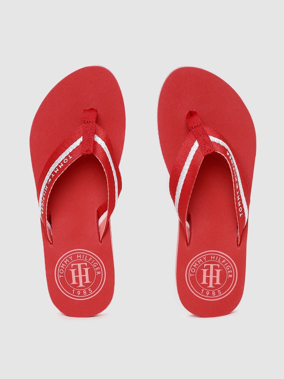 Tommy Hilfiger Women Red & White Striped Essential Mid-Wedge Thong Flip-Flops
Tommy Hilfiger Women Red & White Striped Essential Mid-Wedge Thong Flip-Flops