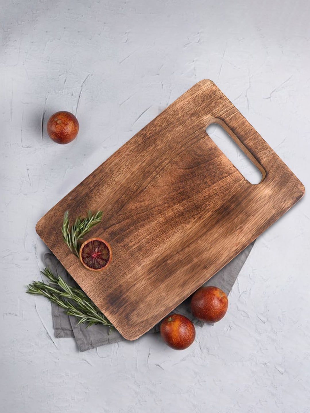 The Indus Valley Brown Wood Compact Mango Chopping Board with Wide Handle
The Indus Valley Brown Wood Compact Mango Chopping Board with Wide Handle