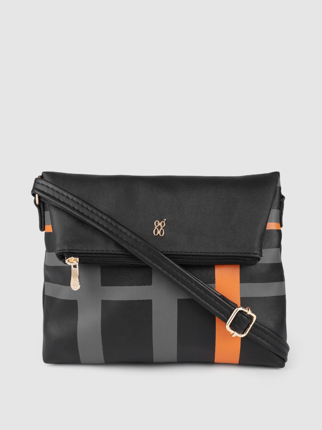 Baggit Black Solid Regular Structured Sling Bag with Checked Detail & Foldable Upper
Baggit Black Solid Regular Structured Sling Bag with Checked Detail & Foldable Upper