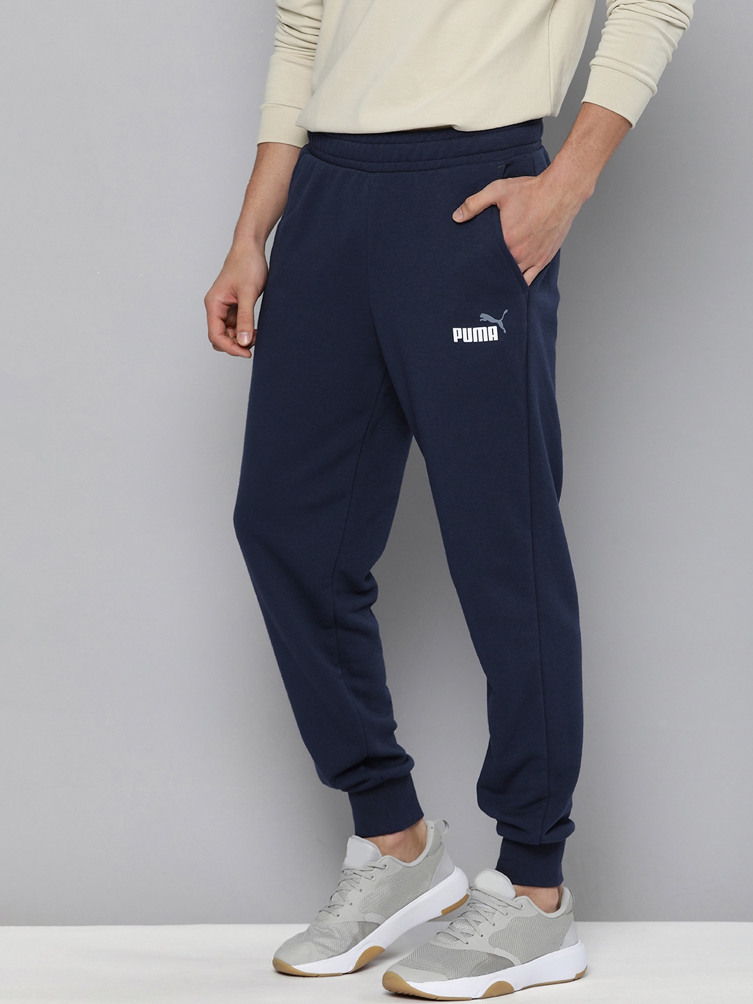 Puma Men Navy Blue Brand Logo Printed Mid-Rise Regular Fit Sustainable Joggers