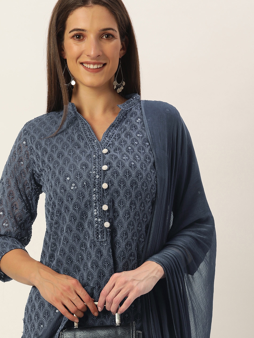 SWAGG INDIA Women Navy Blue Ethnic Motifs Embroidered Chikankari Kurta with Trousers & With Dupatta
SWAGG INDIA Women Navy Blue Ethnic Motifs Embroidered Chikankari Kurta with Trousers & With Dupatta
