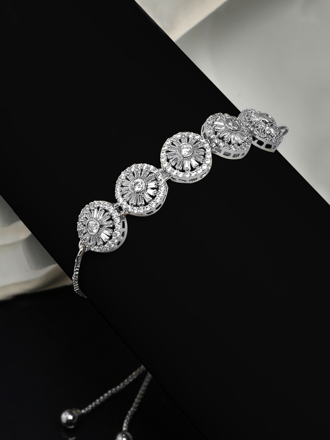 Yellow Chimes Women Silver-Toned & American Diamond Rhodium-Plated Wraparound Bracelet
Yellow Chimes Women Silver-Toned & American Diamond Rhodium-Plated Wraparound Bracelet