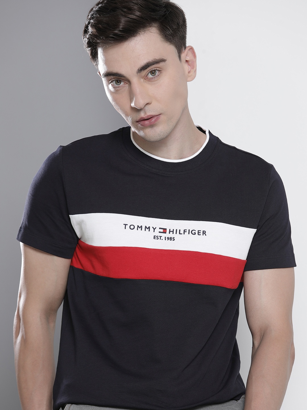 Tommy Hilfiger Men Navy Blue Striped Round Neck Embroidered Pure Cotton T-shirt
Tommy Hilfiger Men Navy Blue Striped Round Neck Embroidered Pure Cotton T-shirt