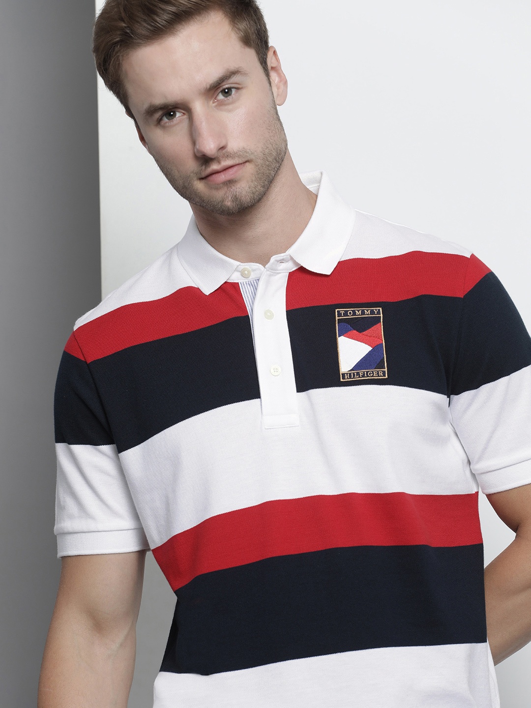 Tommy Hilfiger Men White & Navy Blue Striped Polo Collar Embroidered Pure Cotton T-shirt
Tommy Hilfiger Men White & Navy Blue Striped Polo Collar Embroidered Pure Cotton T-shirt