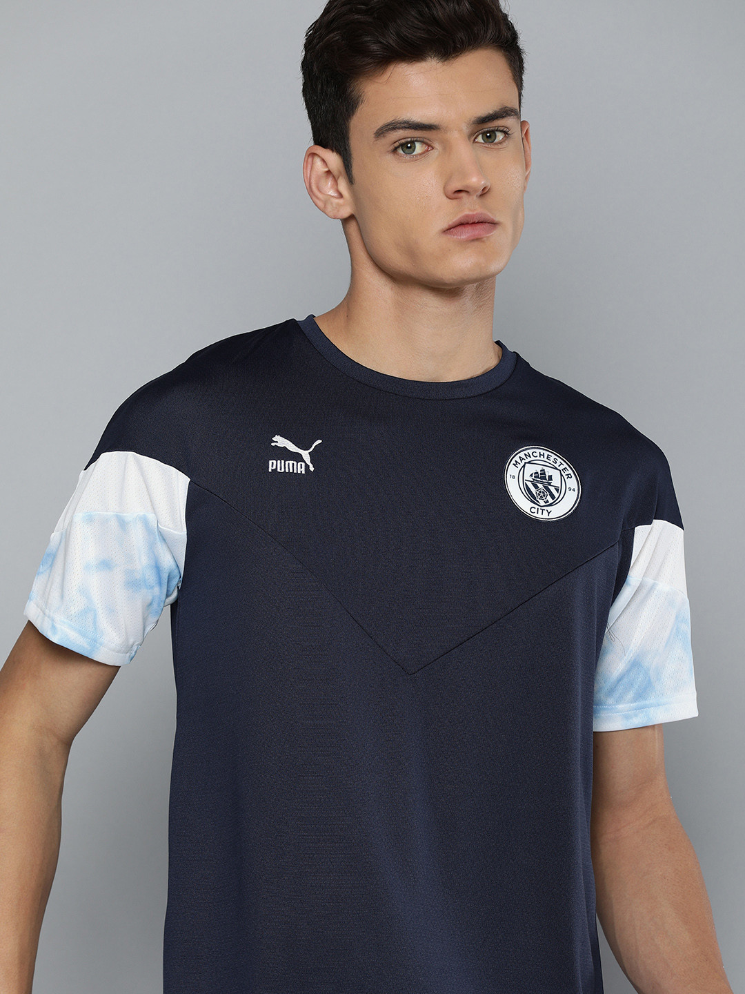 Puma Men Navy Blue Manchester City DryCELL Applique Manchester City Iconic Football T-shirt 
Puma Men Navy Blue Manchester City DryCELL Applique Manchester City Iconic Football T-shirt