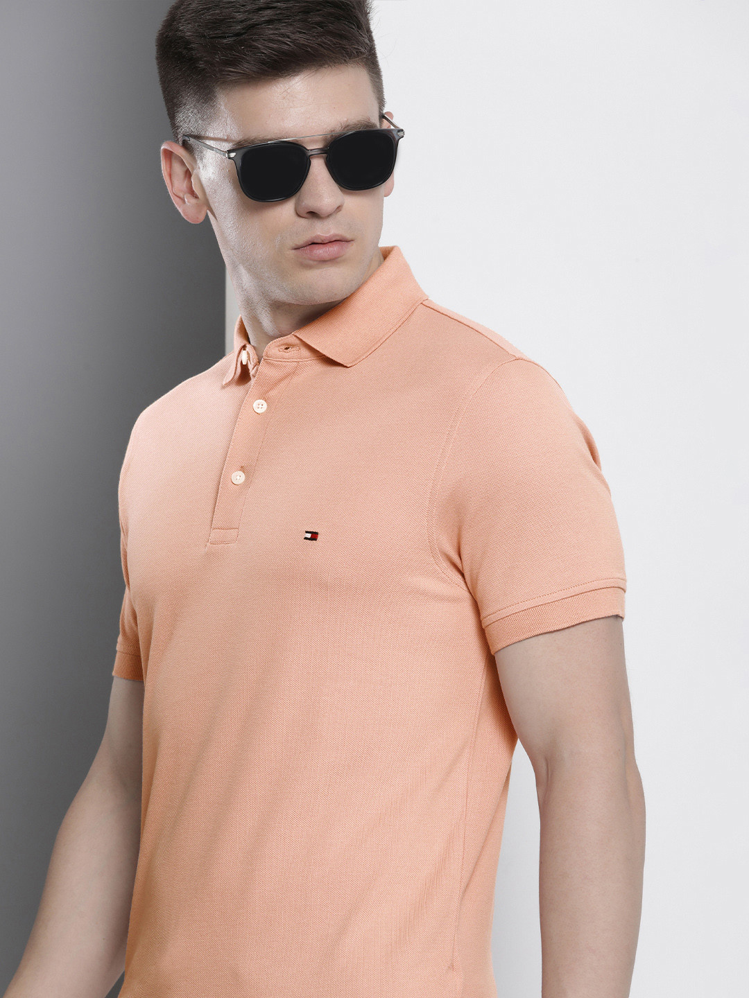 Tommy Hilfiger Men Peach-Coloured Self Design Polo Collar Pure Cotton Slim Fit T-shirt
Tommy Hilfiger Men Peach-Coloured Self Design Polo Collar Pure Cotton Slim Fit T-shirt