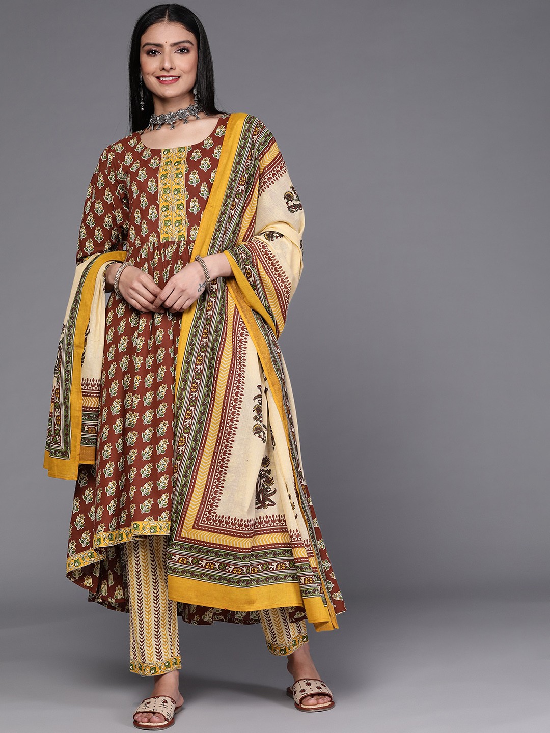 Libas Women Maroon Floral Motifs Printed Panelled Cotton Kurta with Trousers & Dupatta
Libas Women Maroon Floral Motifs Printed Panelled Cotton Kurta with Trousers & Dupatta