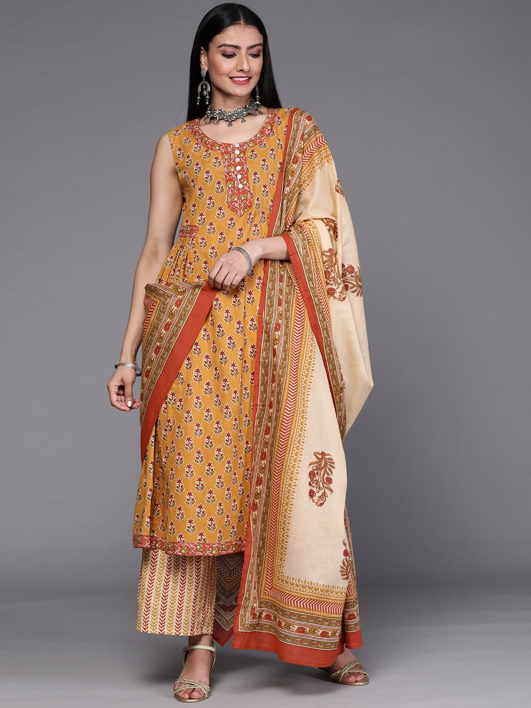 Libas Women Mustard Yellow Floral Printed Empire Pure Cotton Kurta with Palazzos & With Dupatta
Libas Women Mustard Yellow Floral Printed Empire Pure Cotton Kurta with Palazzos & With Dupatta