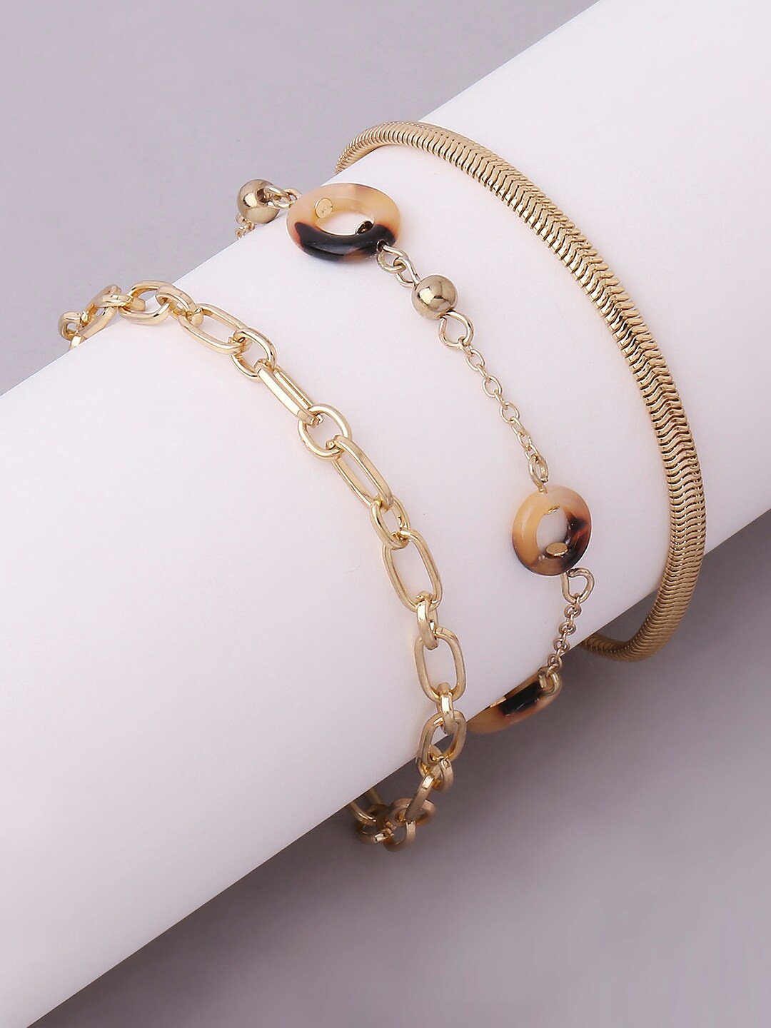 Lilly & sparkle Women Set Of 3 Gold-Toned & Gold-Plated Acetate & Link Chain Bracelet
Lilly & sparkle Women Set Of 3 Gold-Toned & Gold-Plated Acetate & Link Chain Bracelet