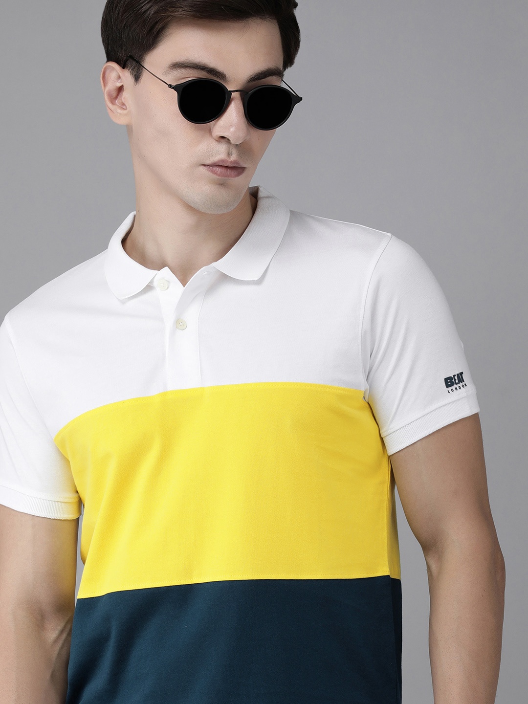 BEAT LONDON by PEPE JEANS Men White & Yellow Colourblocked Polo Collar Slim Fit T-shirt
BEAT LONDON by PEPE JEANS Men White & Yellow Colourblocked Polo Collar Slim Fit T-shirt