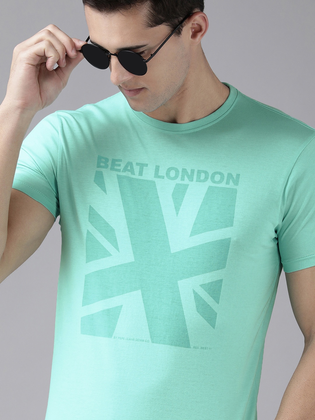 BEAT LONDON by PEPE JEANS Men Sea Green Brand Logo Printed Pure Cotton Slim Fit T-shirt
BEAT LONDON by PEPE JEANS Men Sea Green Brand Logo Printed Pure Cotton Slim Fit T-shirt