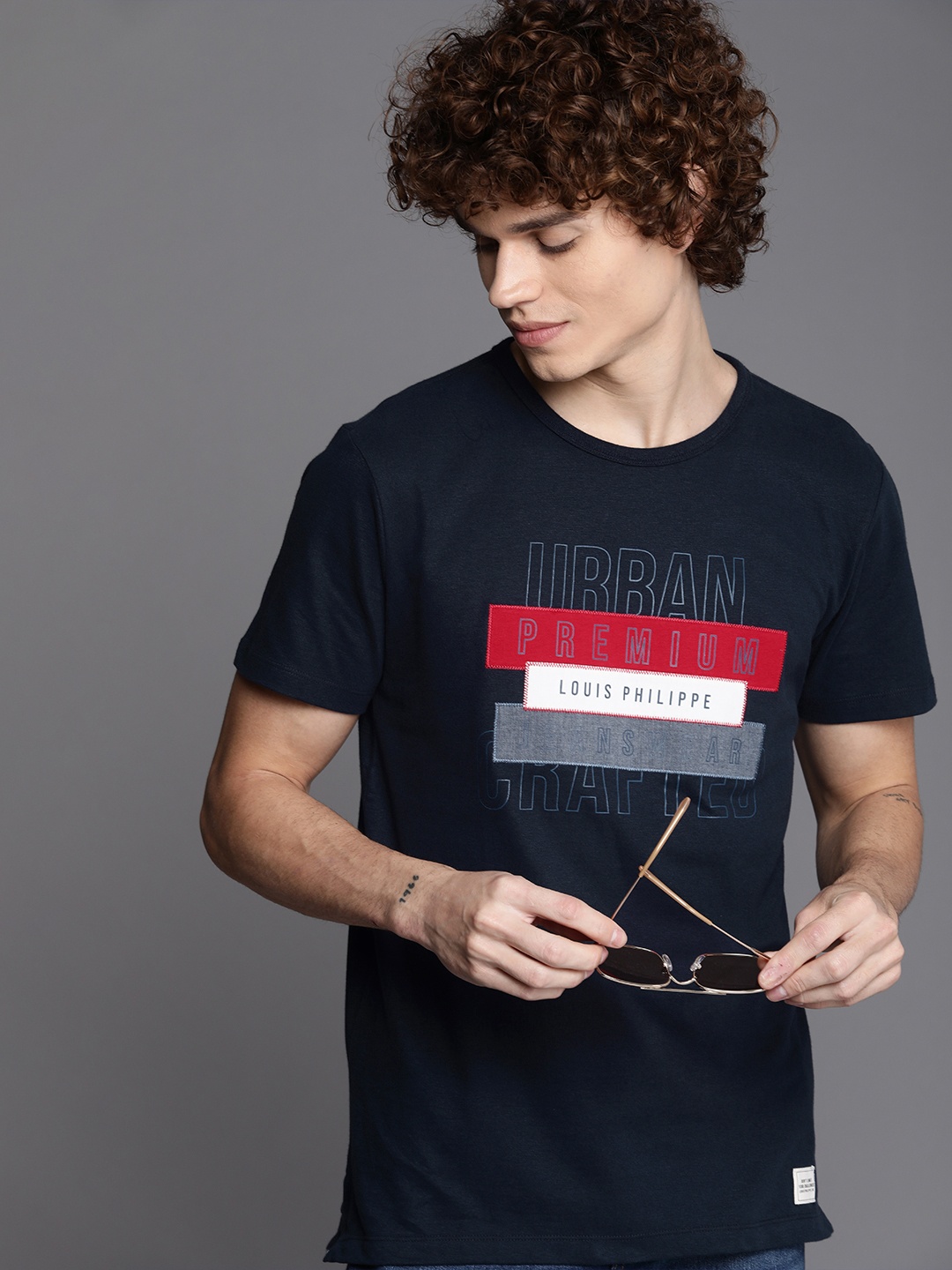 Louis Philippe Jeans Men Navy Blue & White Brand Logo Printed Pure Cotton Slim Fit T-shirt
Louis Philippe Jeans Men Navy Blue & White Brand Logo Printed Pure Cotton Slim Fit T-shirt
