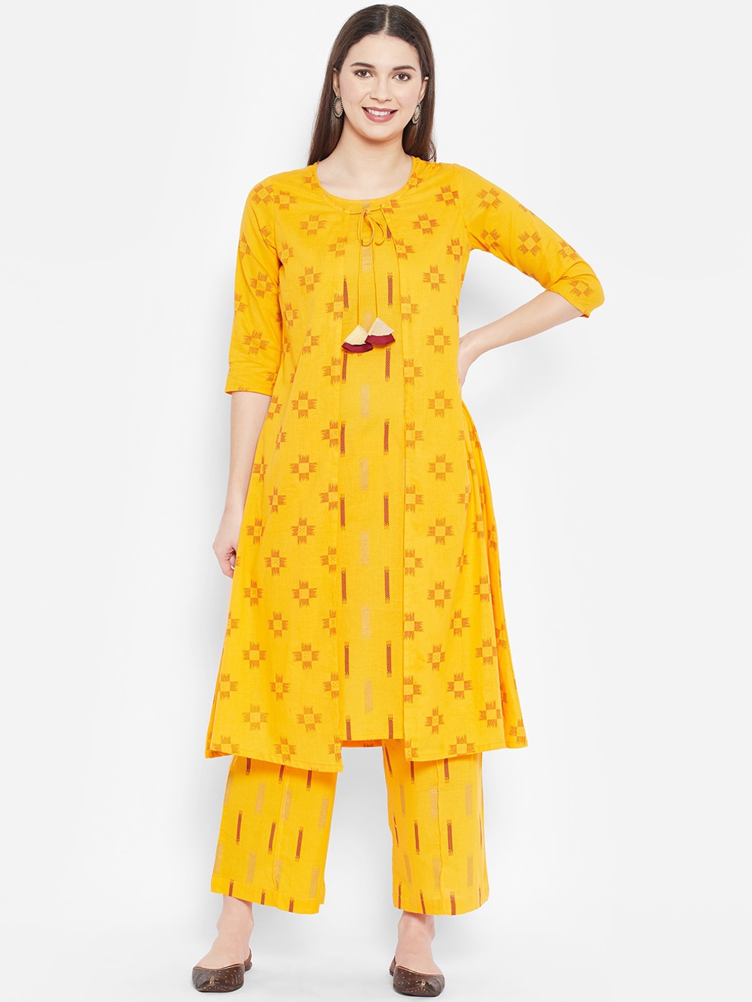 DESI BEATS Women Mustard Yellow Floral Printed Pleated Pure Cotton Kurti with Palazzos
DESI BEATS Women Mustard Yellow Floral Printed Pleated Pure Cotton Kurti with Palazzos
