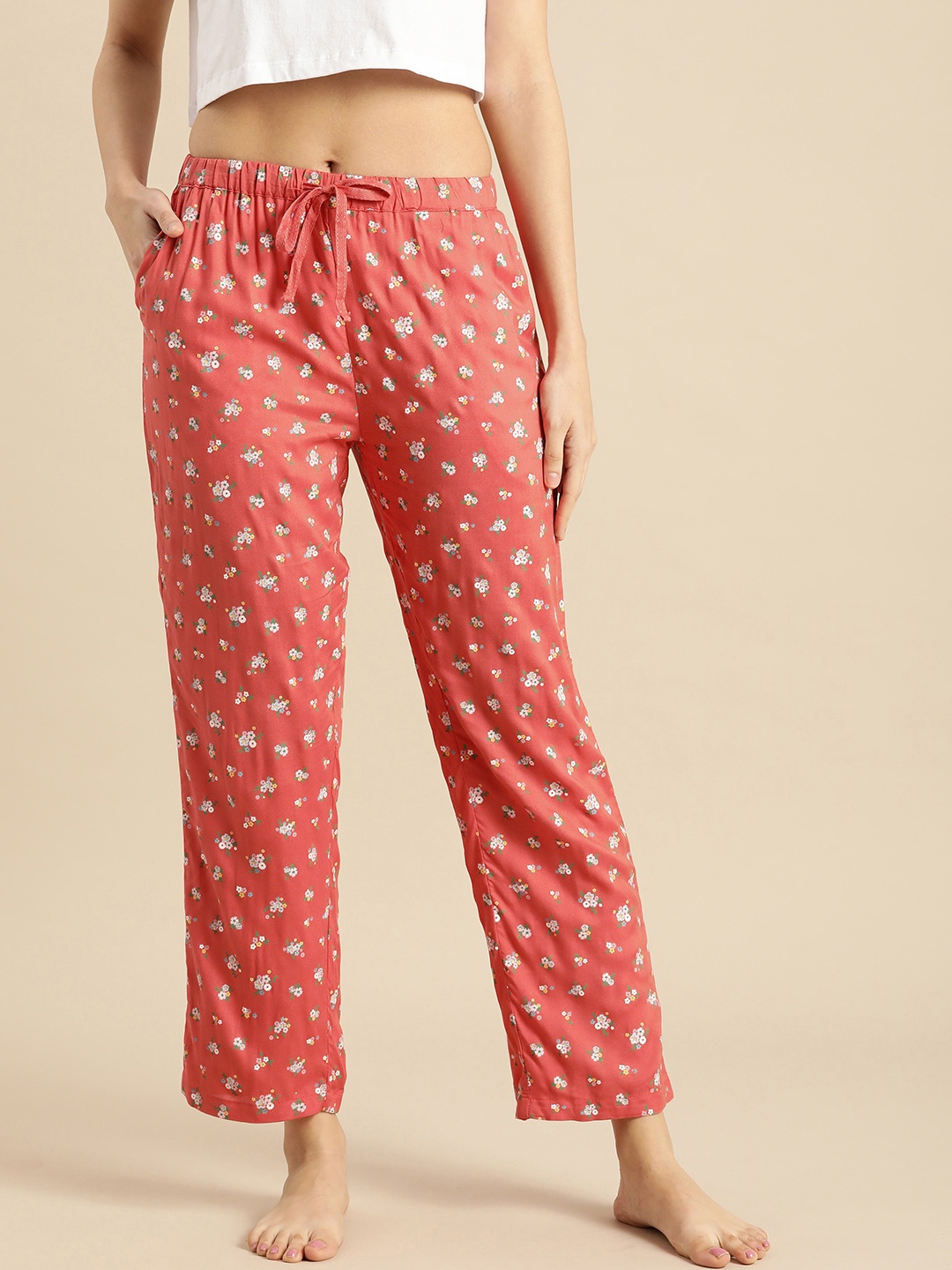 Dreamz by Pantaloons Women Coral Orange Mid-Rise Floral Print Viscose Rayon Lounge Pants
Dreamz by Pantaloons Women Coral Orange Mid-Rise Floral Print Viscose Rayon Lounge Pants